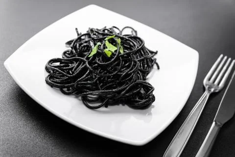 Spaghetti with squid ink Stock Photos