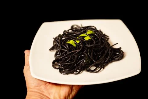 Spaghetti with squid ink Stock Photos