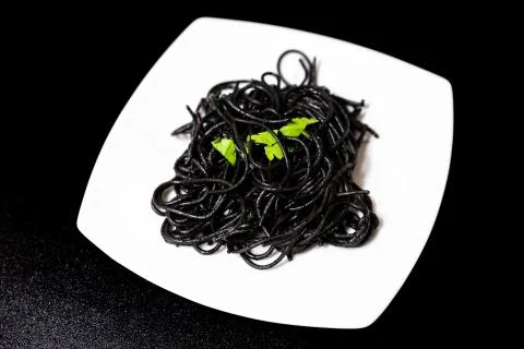 Spaghetti with squid ink Stock Photos