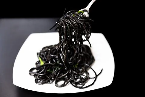 Spaghetti with squid ink Stock Photos