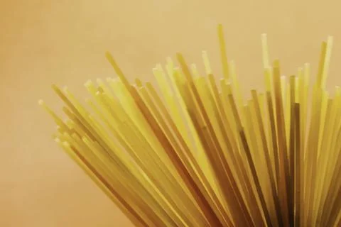 Spaghetti, standing in vase. Background texture with spaghetti vision Stock Photos