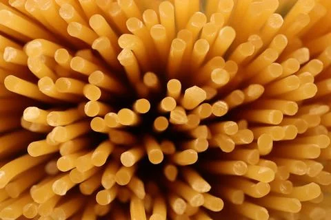 Spaghetti texture. Macaroni backdrop. Pasta filling background. Stock Photos