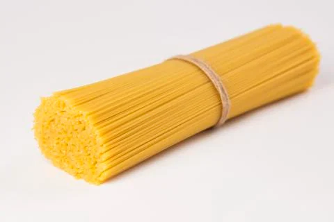 Spaghetti tied with a brown thread. 写真素材
