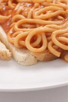 Spaghetti on toast Stock Photos