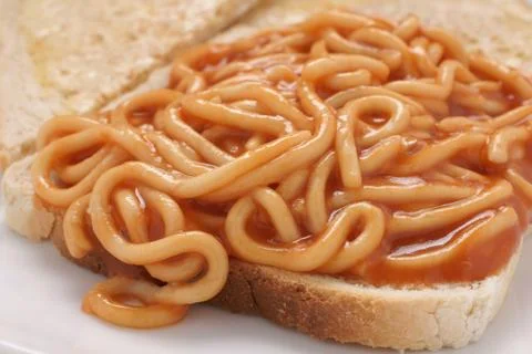 Spaghetti on toast Stock Photos