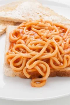 Spaghetti on toast Stock Photos