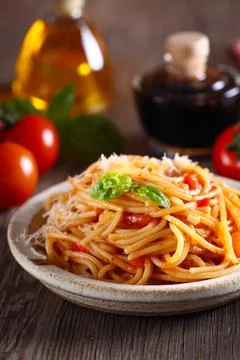 Spaghetti with tomato sauce and cheese Stock Photos