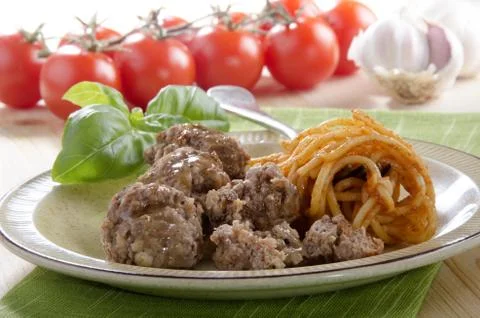 Spaghetti with tomato sauce on a fork Stock Photos