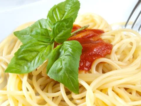 Spaghetti with tomatoes Stock Photos