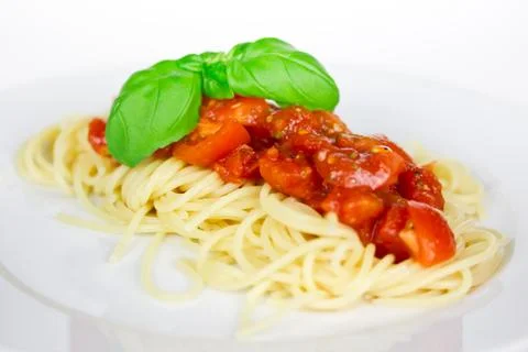 Spaghetti with tomatoes Stock Photos
