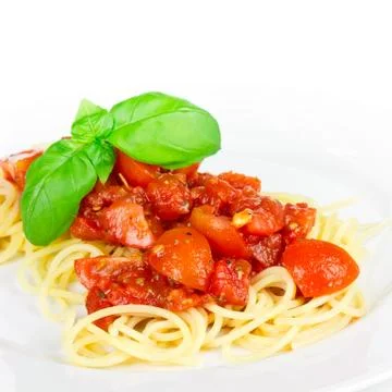 Spaghetti with tomatoes Stock Photos