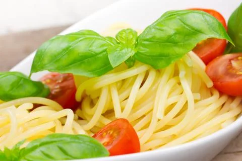 Spaghetti with tomatoes Stock Photos