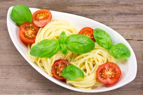 Spaghetti with tomatoes Stock Photos