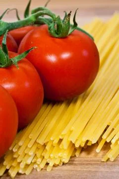 Spaghetti with tomatoes Stock Photos