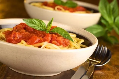 Spaghetti with tomatosauce Stock Photos