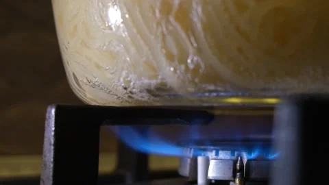 Spaghetti in a transparent pan with boiling water. Spaghetti in boiling water Stock Footage 284174464