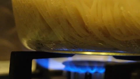 Spaghetti in a transparent pan close-up. Spaghetti in a transparent pan with Stock Footage 283412128