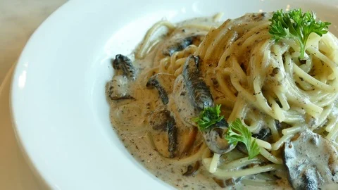 Spaghetti truffle in white plate Stock Footage 77743297