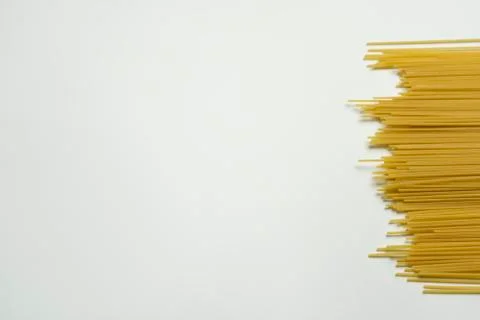 Spaghetti uncooked isolated on white background with copy space.Creative heal Stock Photos