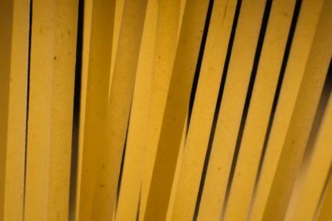 Spaghetti wall, abstract composition with raw spaghetti, like bamboo forest Stock Photos