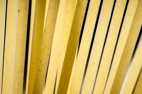 Spaghetti wall, abstract composition with raw spaghetti, like bamboo forest Stock Photos