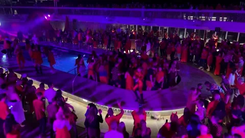 Spain Barcelona 10.27.2024 dancing by the pool party on a cruise ship people Stock Footage 292969765