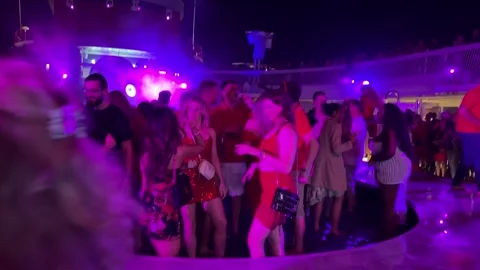 Spain Barcelona 10.27.2024 dancing by the pool party on a cruise ship people Stock Footage 295421789