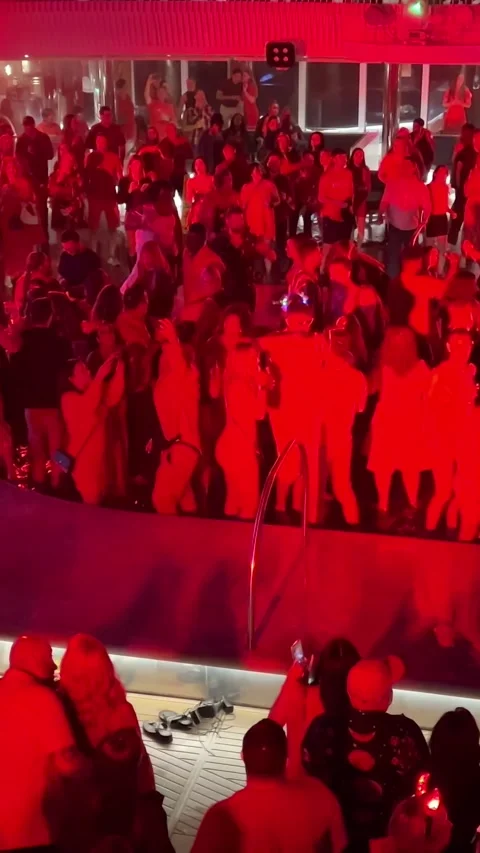 Spain Barcelona 10.27.2024 dancing by the pool party on a cruise ship people Stock Footage 302108373