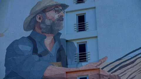 Spain, Can Picafort, 06-11-2025. Murals on fishermen's house. Panning 4K 库存影片 317530160
