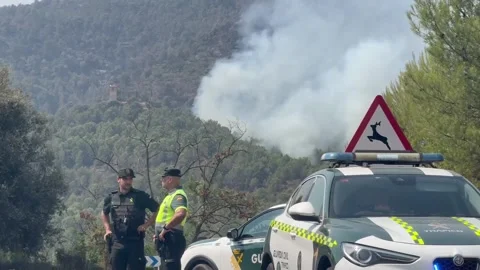 Spain deploys aircraft against flames near Santa Bárbara chapel, Onda (Castellón Stock-Footage 340816780