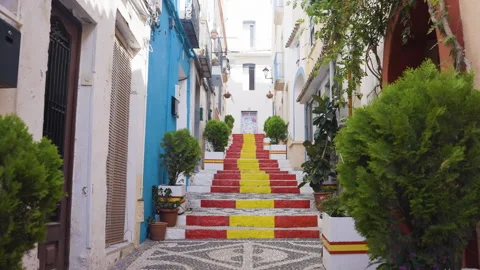Spain Flag Colours On Steps Leading Through Old Town Stock Footage 254861067