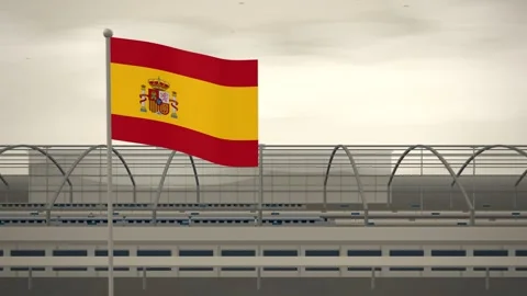 Spain Flag Flying Over High Speed Rail Station seamless loop Stock Footage 344848899