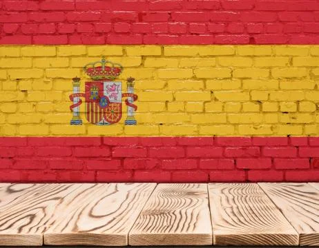 Spain flag painted on brick wall with wooden floor Stock Illustration