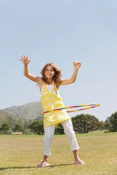 Spain, Mallorca, Girl (10-11) playing with hola hoop Stock Photos