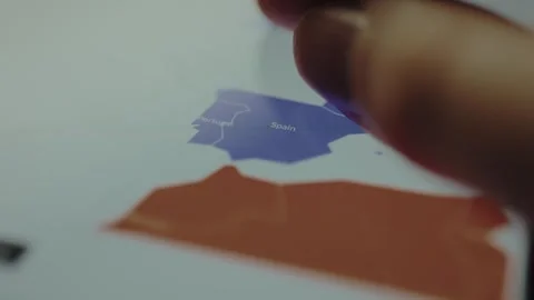 Spain on the map of Europe, person interacts with the map Video stock 328379228