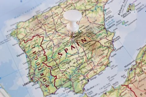 Spain on the map of the world. Stock Photos