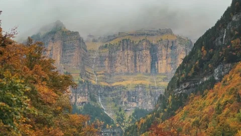 Spain Ordesa y Monte Perdido, Autumn Stream and Clouds in Mountains Stock Footage 317550703