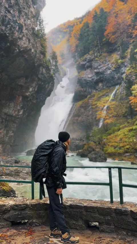 Spain Ordesa y Monte Perdido, Man Admiring Waterfall Vertical Video Stock Footage 317550717