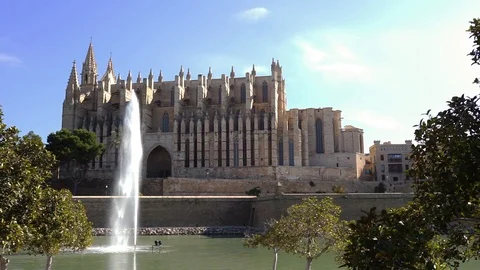 Spain Palma de Mallorca, Cathedral La Seu with fountain at lake Stock Footage 100673135