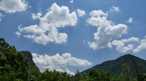 Spain Pyrenees clouds in blue sky Stock Footage 62730633