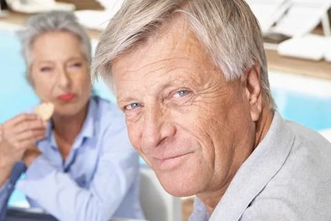 Spain, Senior couple having lunch at Mallorca Stock Photos