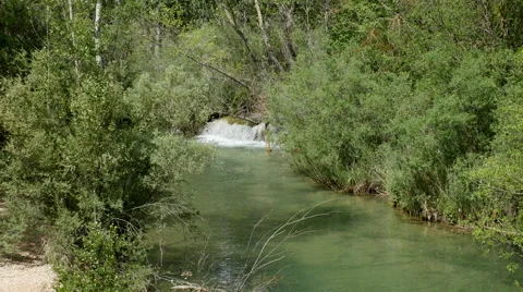 Spain Serrania de Cuenca Rio Jucar with small waterfall sound Stock Footage 62729958