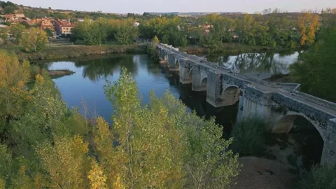 Spain Simancas flying over 13th century bridge Stock-Footage 233286518