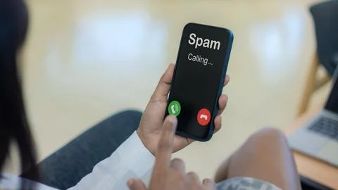 Spam call notification on smartphone screen alert. Cyber scam and telemarke.. Stock Photos