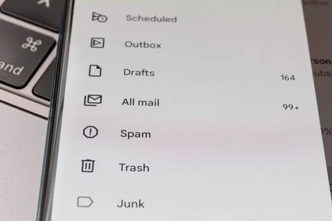 Spam in email inbox. Email inbox on smartphone - junk, trash, spam Stock Photos