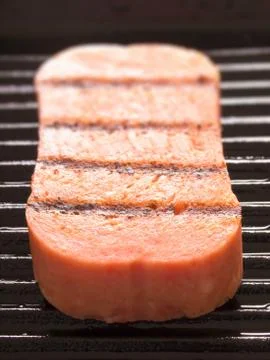Spam on a grill Stock Photos