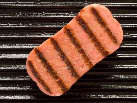Spam on a grill Stock Photos