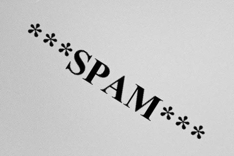 Spam marker on a computer screen. Stock Photos