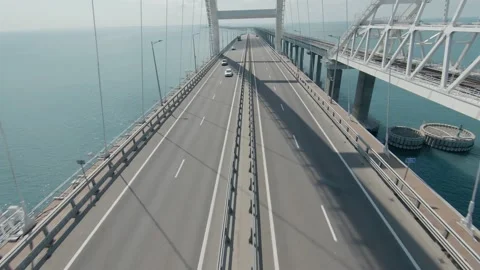 Span in the arch of the Crimean bridge towards the truck Stock Footage 230155902