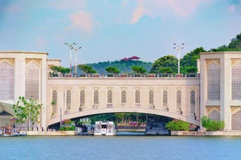 Span of arched bridge over the river. View of the water bridge Stock Photos
